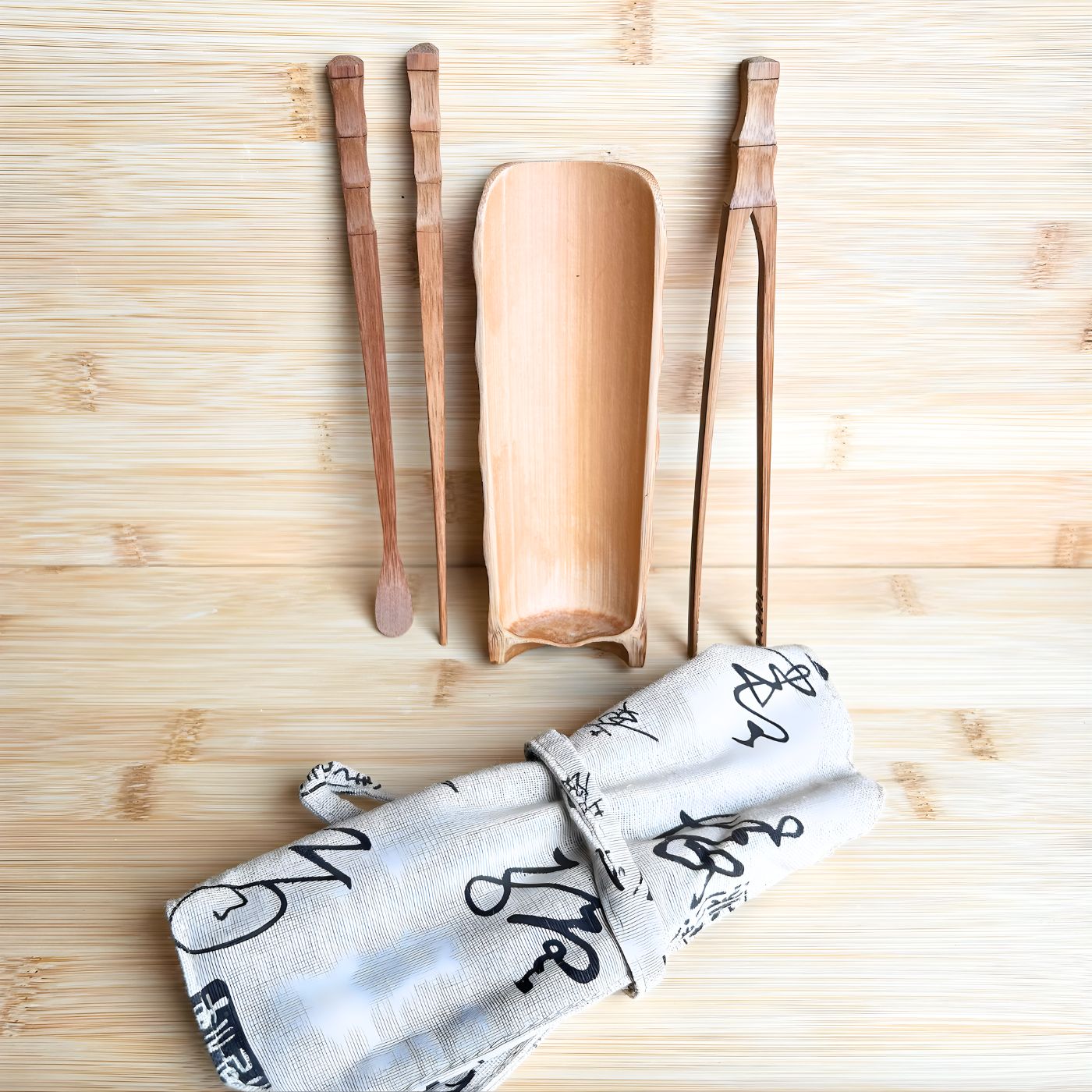 Bamboo tea tools arranged on table