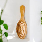 Bamboo paddle brush on vanity