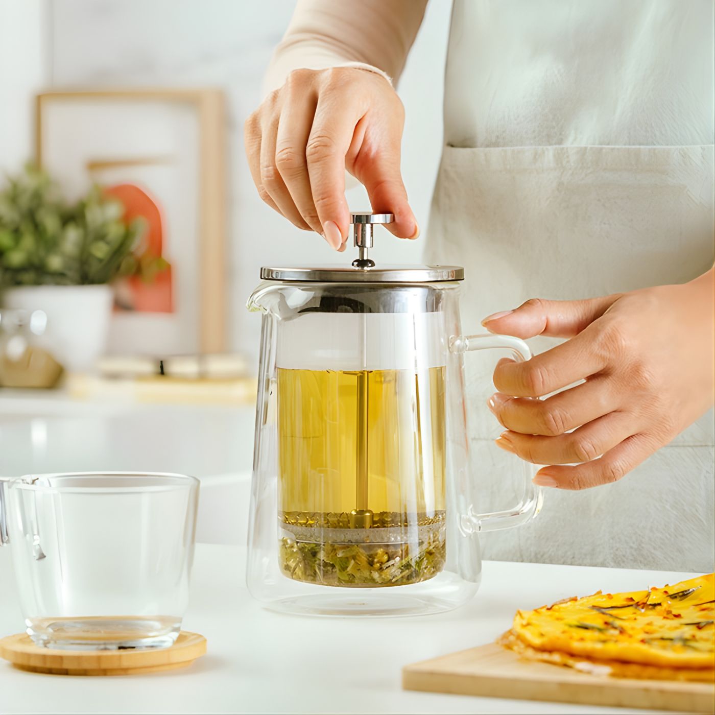 Glass French press tea maker with loose leaf tea