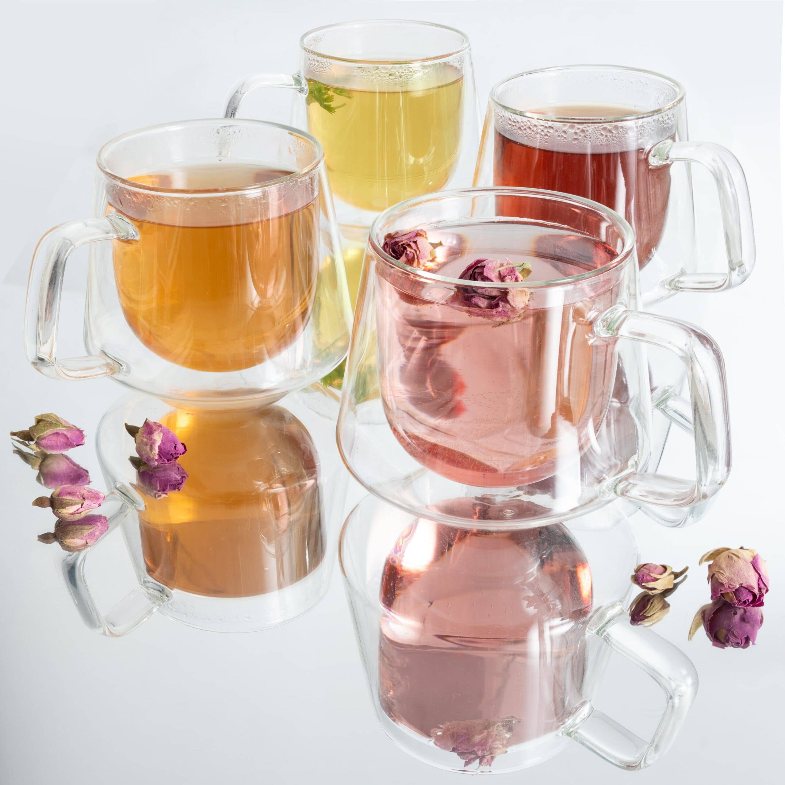 Insulated double wall glass mugs with teas