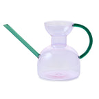 Modern watering can with long spout purple