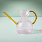 Modern watering can with long spout pink