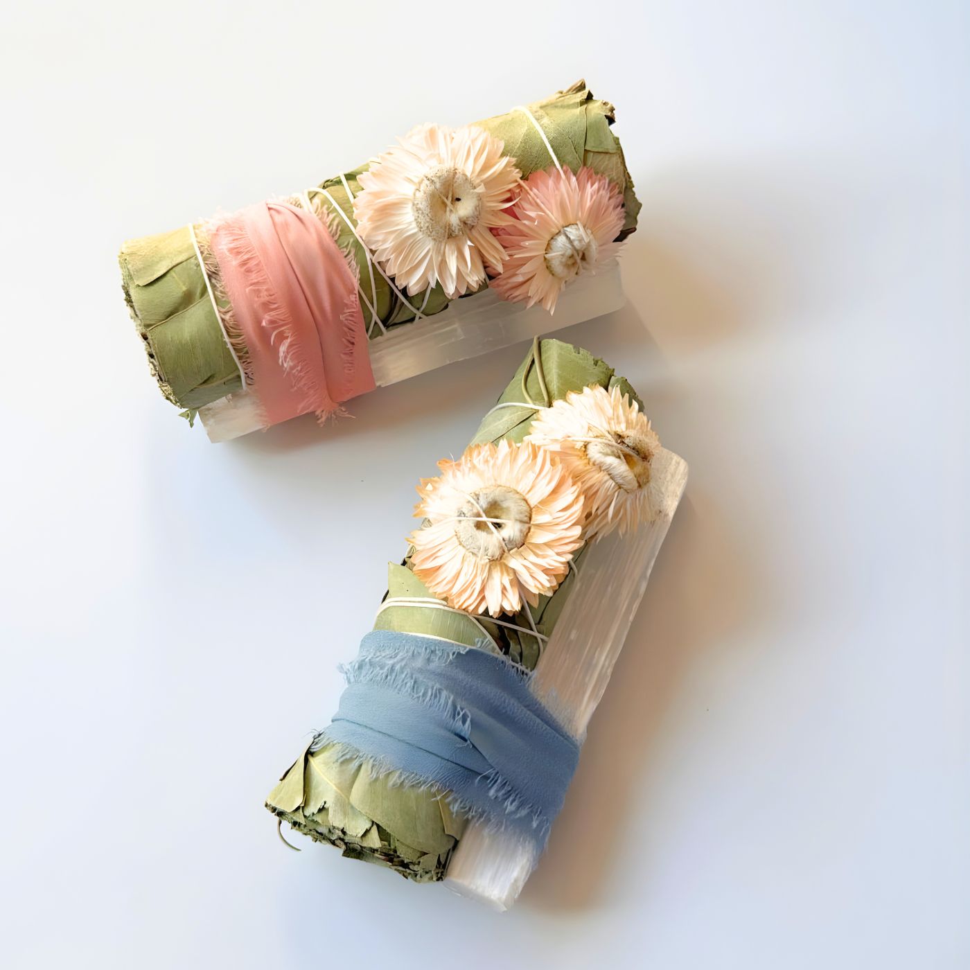 Sage sticks for cleansing with straw flowers