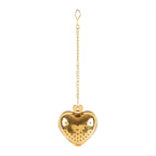 Gold heart tea ball with fine mesh design front view