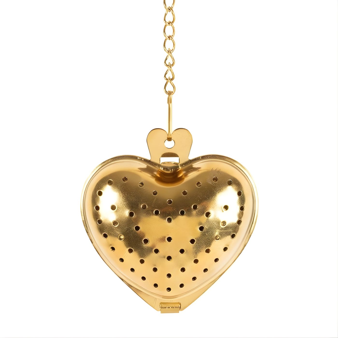 Close-up of gold mesh and latch on heart tea infuser