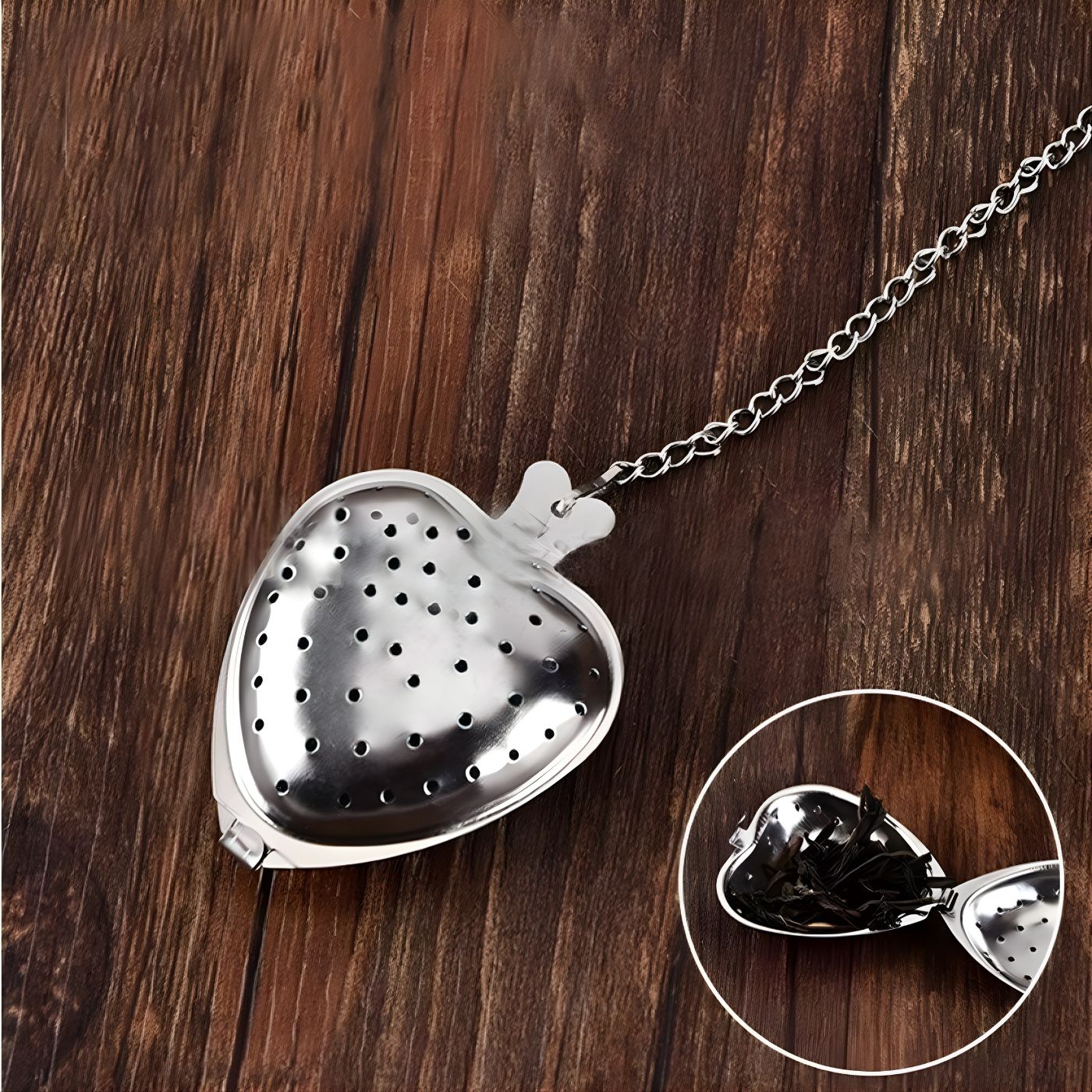 Heart-shaped stainless steel loose leaf tea infuser with view of opened heart tea ball