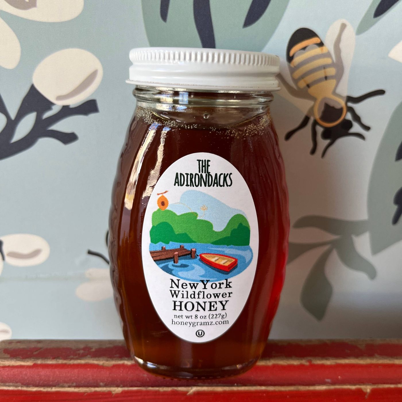 Local wildflower honey on shelf