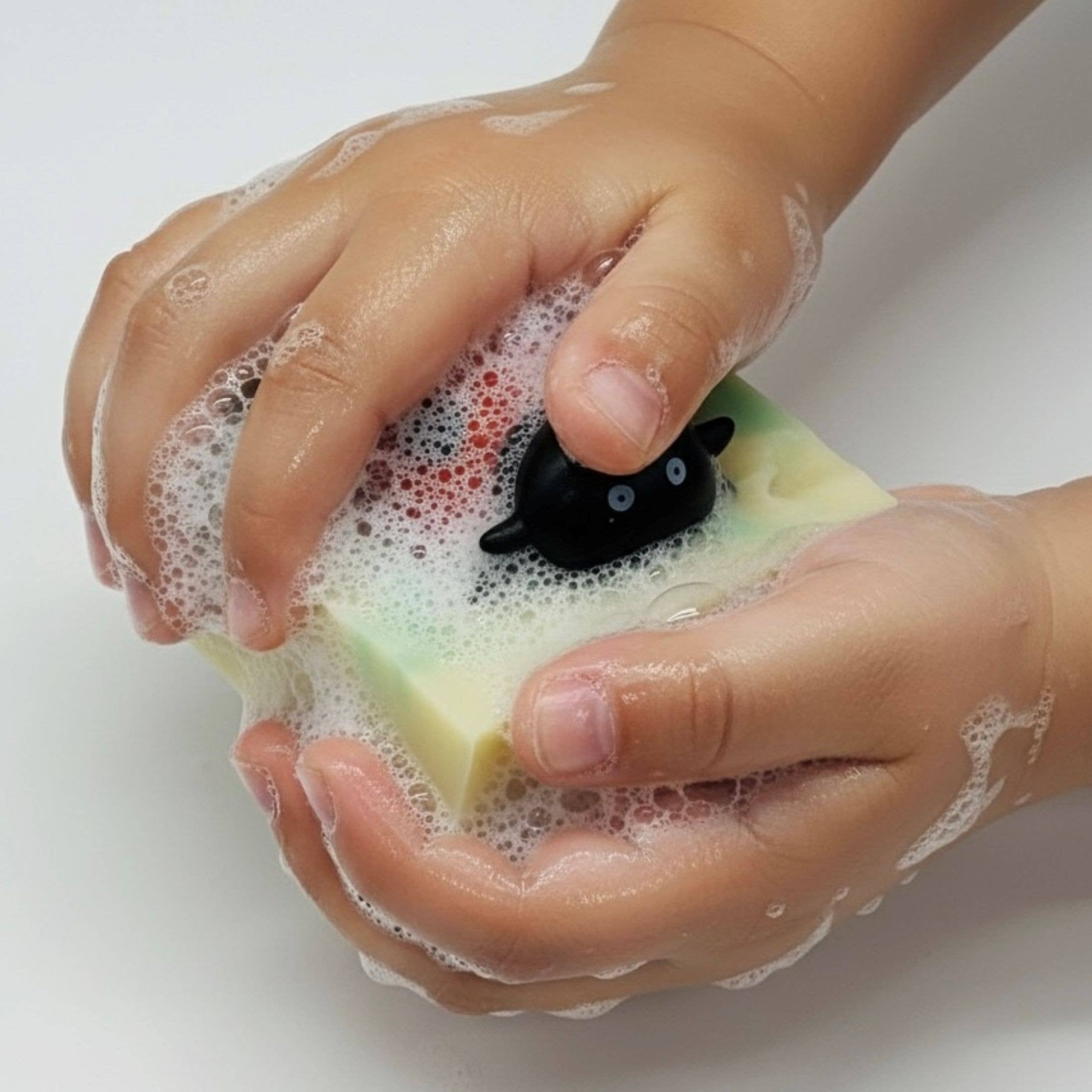 Foaming soap bar for kids with hidden ladybug