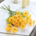 Faux daisy flower in yellow
