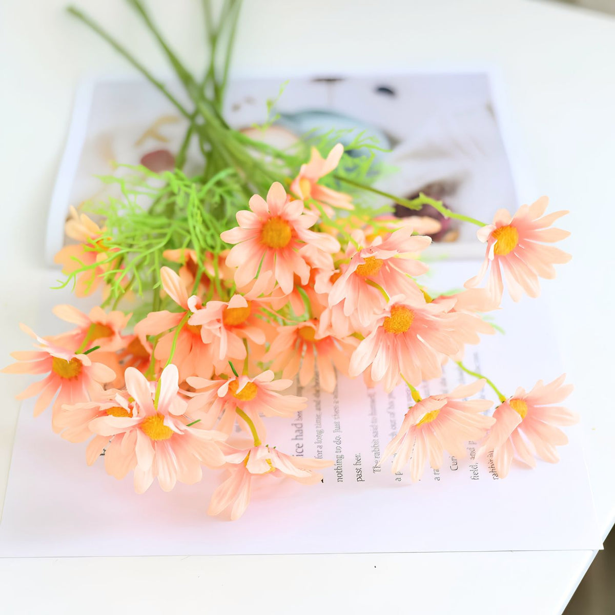 Faux daisy flower in champagne