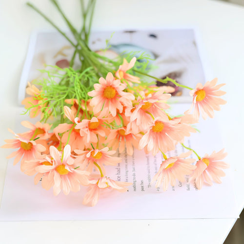 Faux daisy flower in champagne