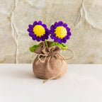 Double-headed crochet daisy décor purple