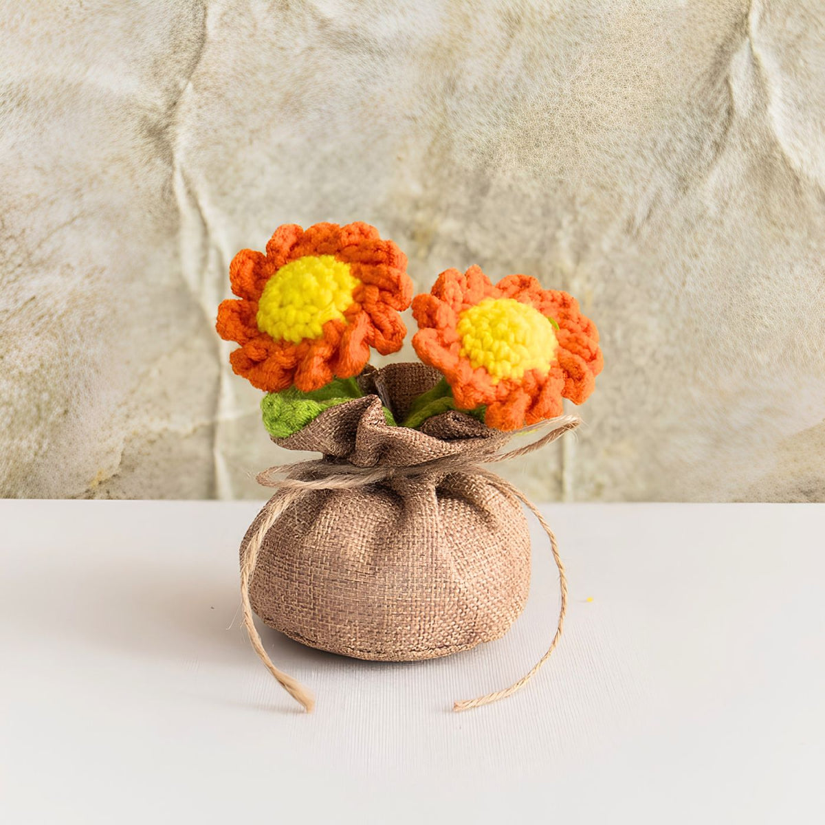 Double-headed crochet daisy décor orange