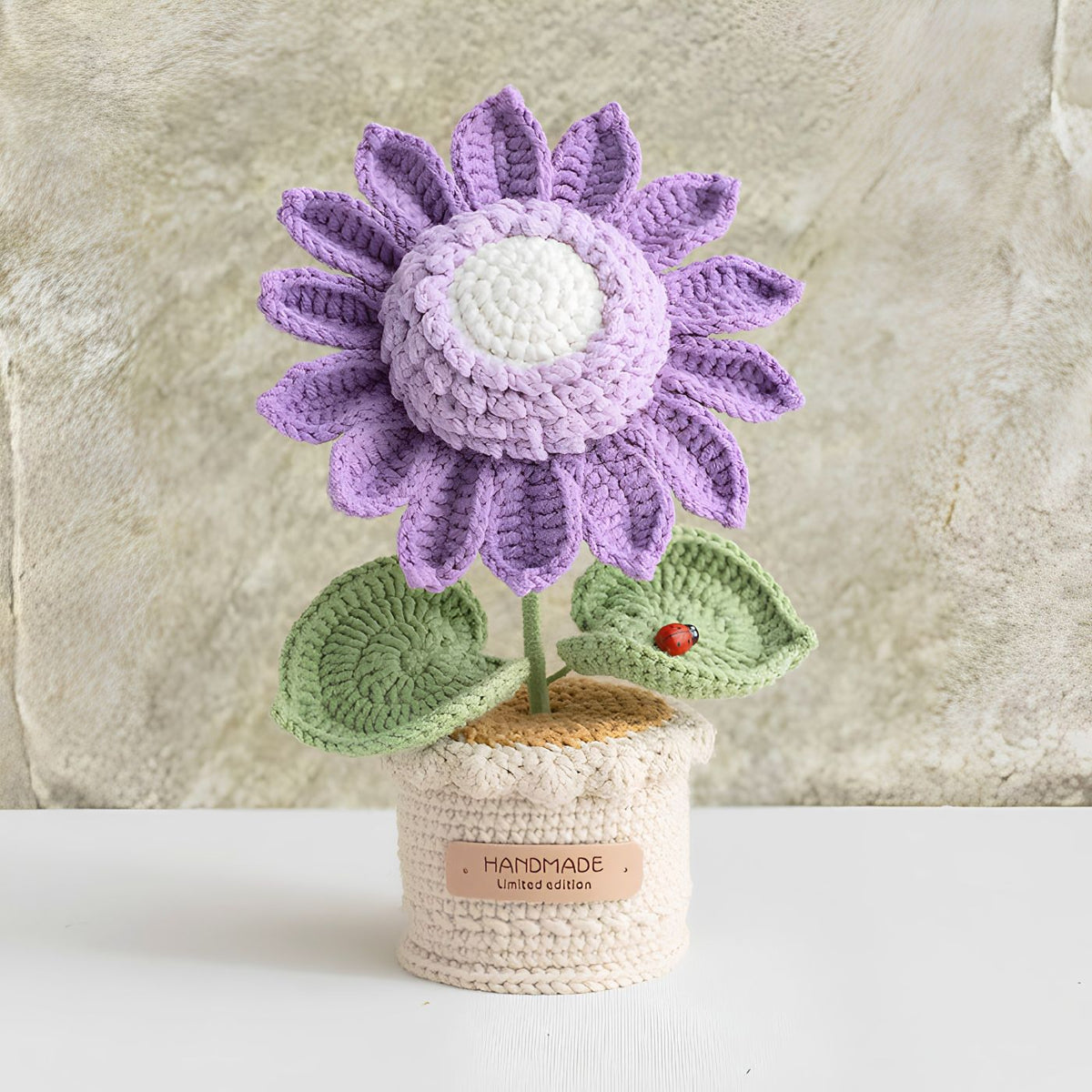 Colorful handmade crochet sunflower purple