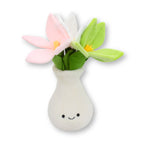 Plush lily flower in smiling vase