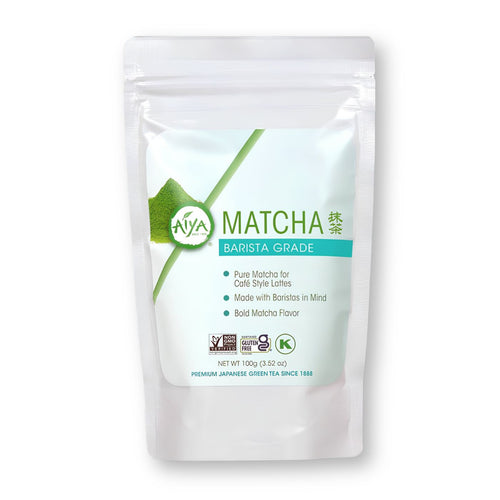 Barista matcha powder latte preparation