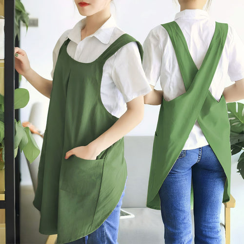 Green cross-back kitchen apron with two front pockets