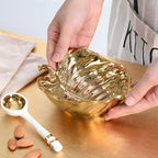 Gold leaf porcelain bowl and spoon gift set  preparing to serve