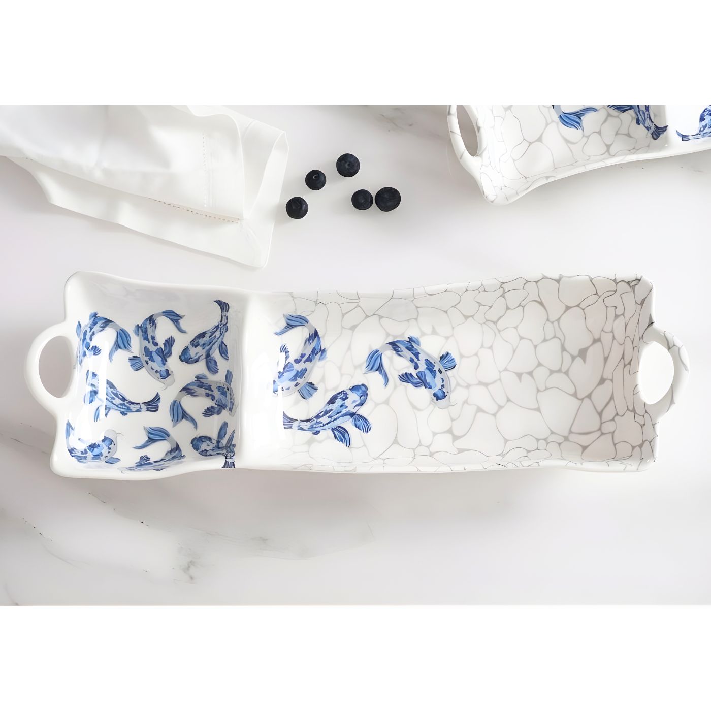Blue koi divided serving dish with built-in dip bowl