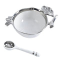 White porcelain pomegranate bowl with silver trim and spoon