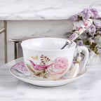 Floral tea cup and saucer with peonies and birds