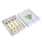 Set of four tea spoons with lily of the valley ceramic handles