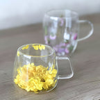Floral double wall glass coffee mug with golden blossoms