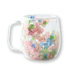 Double wall glass mug with spring garden blossoms