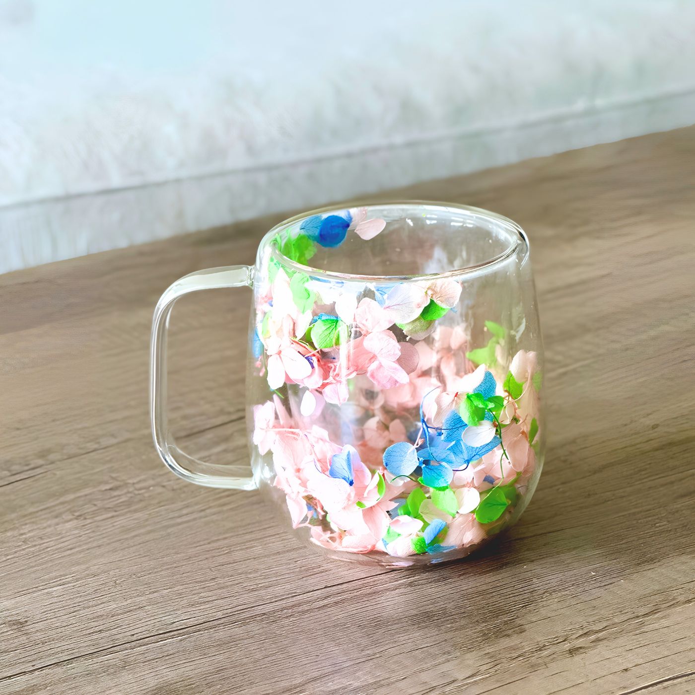 Double wall glass coffee mug with colorful floral design