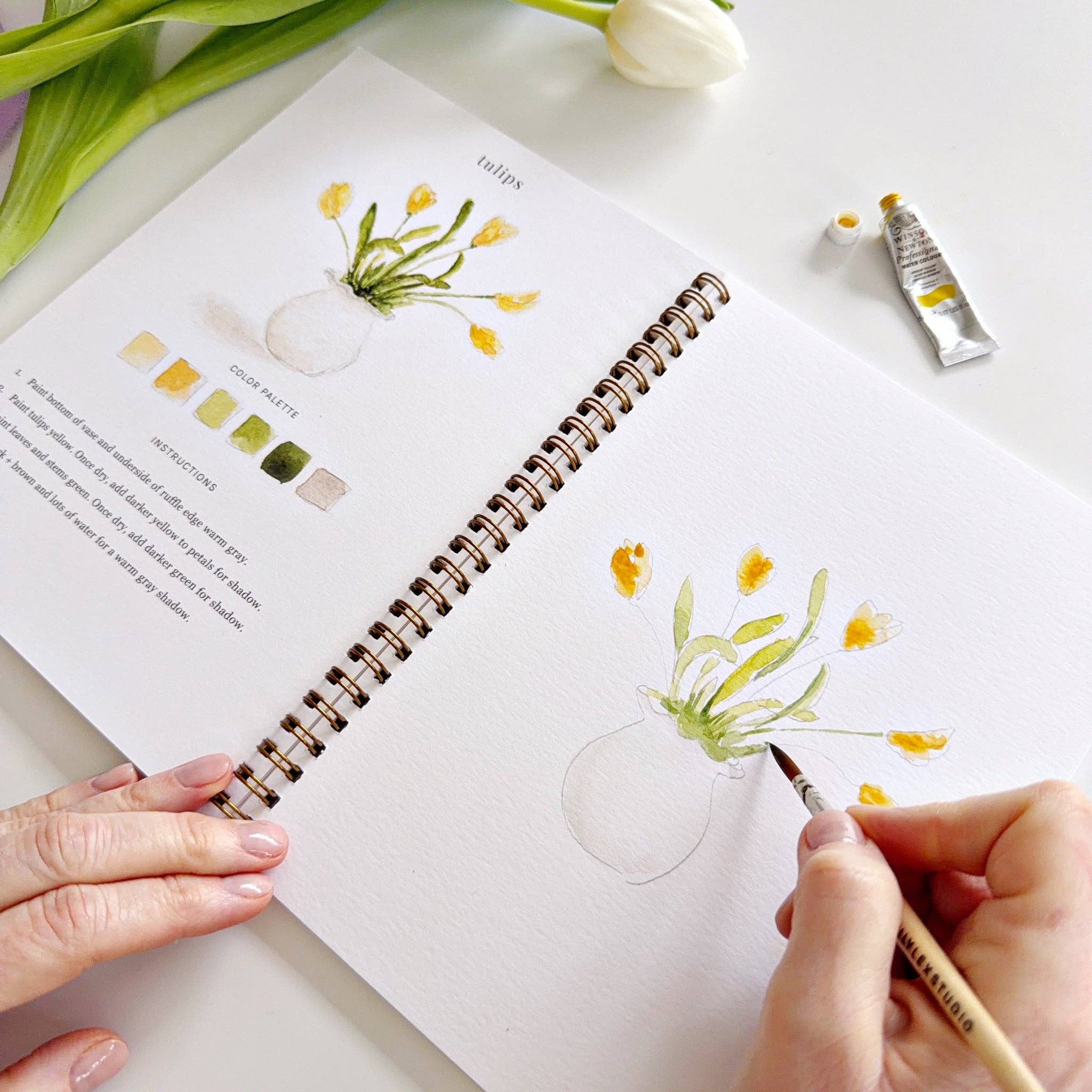 Spring watercolor workbook bunny tulips painting pages close up