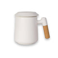 Porcelain tea mug with infuser and lid in white with wood handle