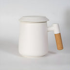 Ceramic tea mug with infuser and lid - side view
