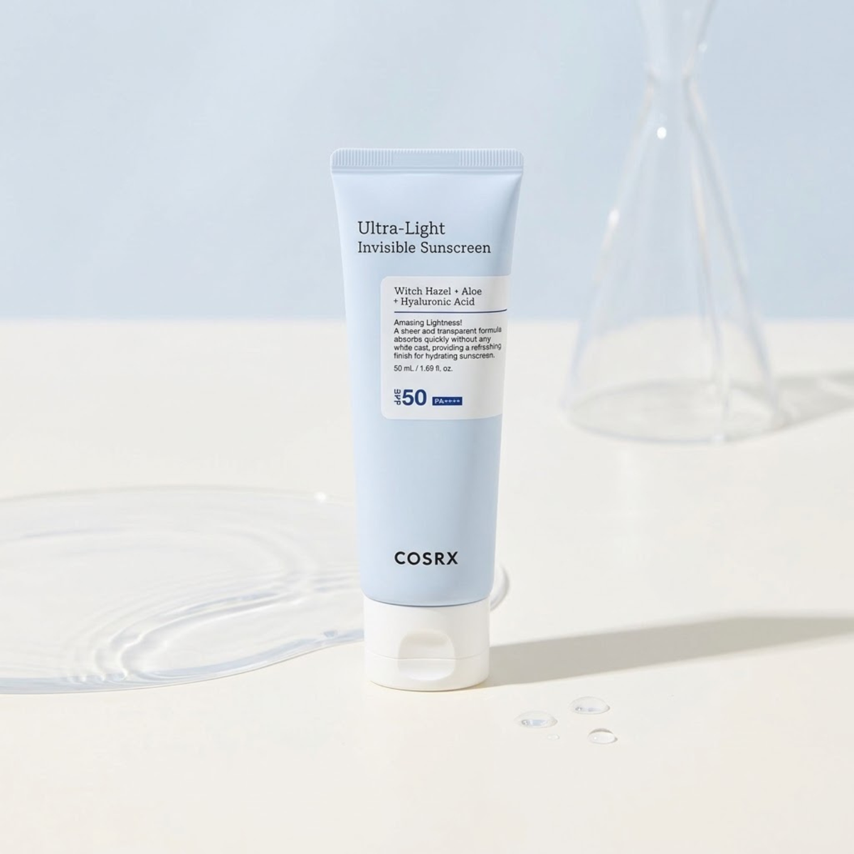 COSRX Ultra-Light Invisible Sunscreen SPF 50 PA++++ 50 mL Korean facial sunscreen with background