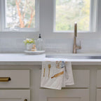 100% cotton flour sack tea towel featuring baking artwork