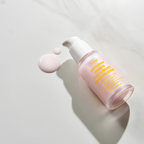 Applying JUSTBEME revital energy serum on face