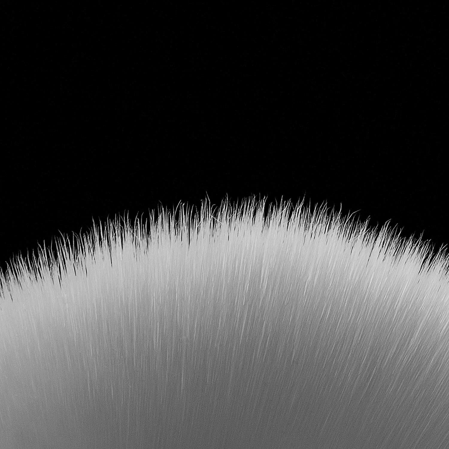 Close-up view of ultra-fine bristles of the Kai High Density Facial Cleansing Brush for gentle, deep pore cleaning