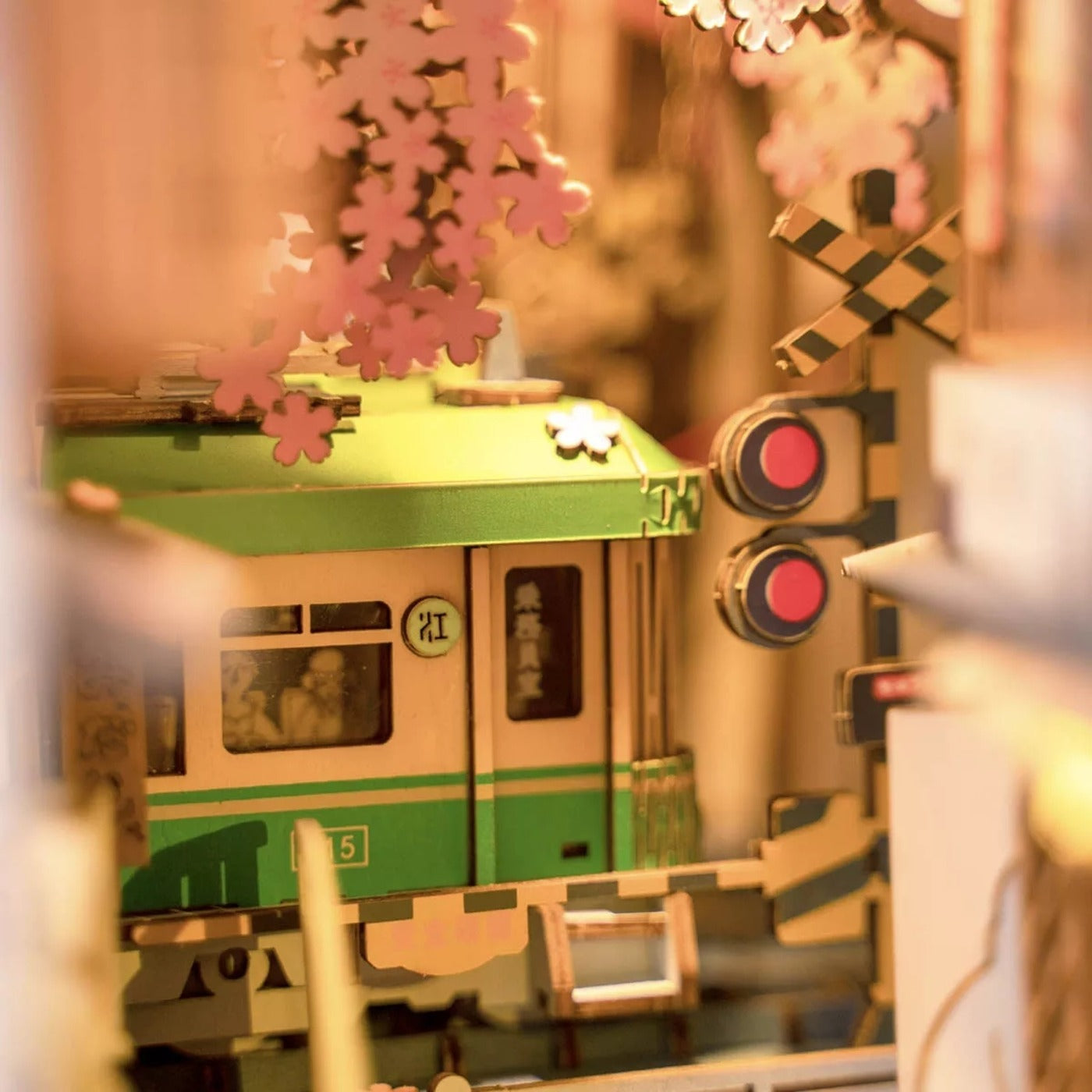 DIY Japanese book nook with cherry blossoms and tram