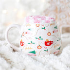 Festive sugarplum Christmas mug displayed in cozy holiday setting