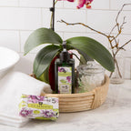Via Mercato Waterlily & Sandalwood hand soap beside a bathroom sink
