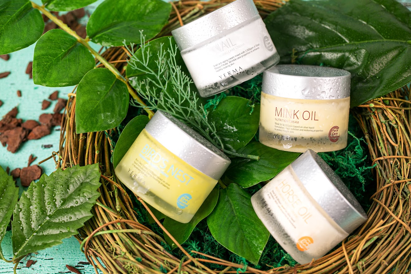 Applying Yerma multi cream on face for hydration