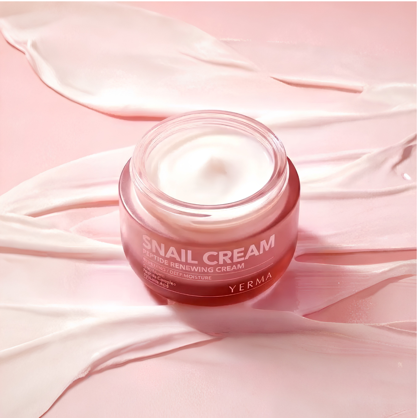 Applying Yerma snail cream on face moisturizer